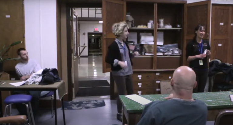 Teacher instructing class at Oakhill Correctional Facility